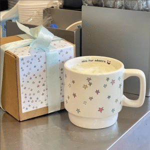White ceramic mug with star design